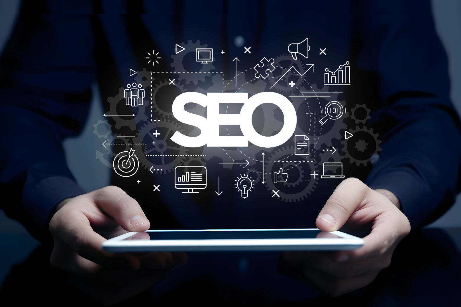 Person holding tablet with digital SEO icons and data analytics graphics